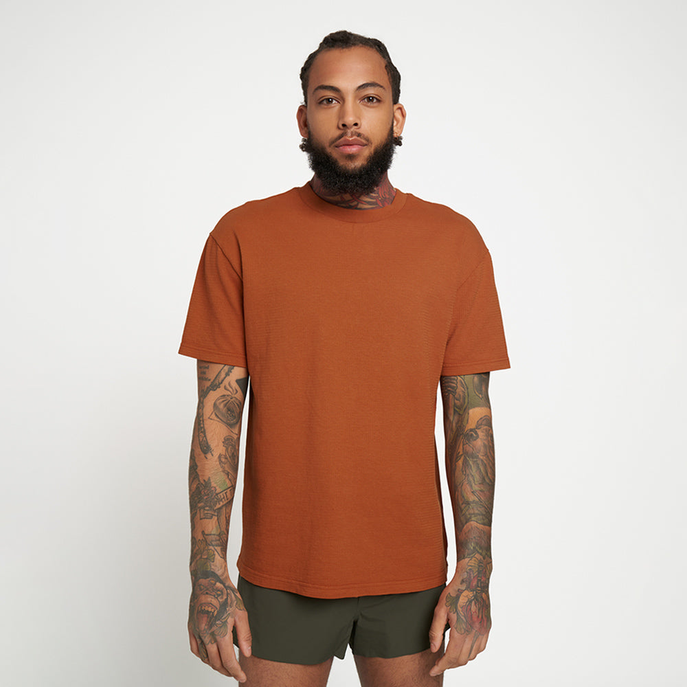 Model_Text: model is 6'2" and wears a medium