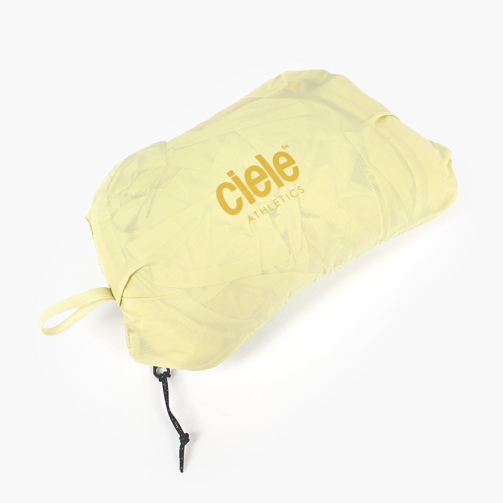 view of the ciele athletics VNTJacket lightweight running jacket for men in glade color when folded in one of it's pocket 