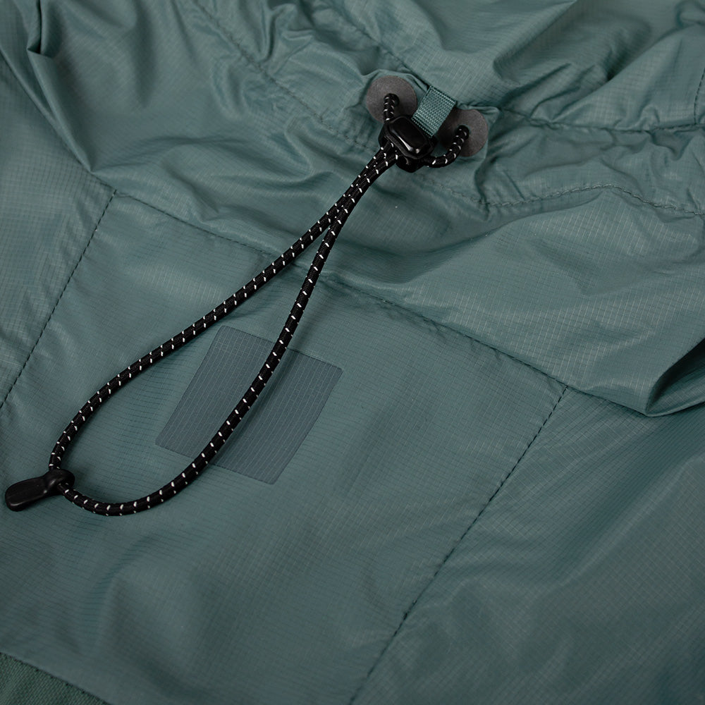 closeup view of the adjustable hood feature of the ciele athletics VNTJacket lightweight running jacket for men in silver pine color