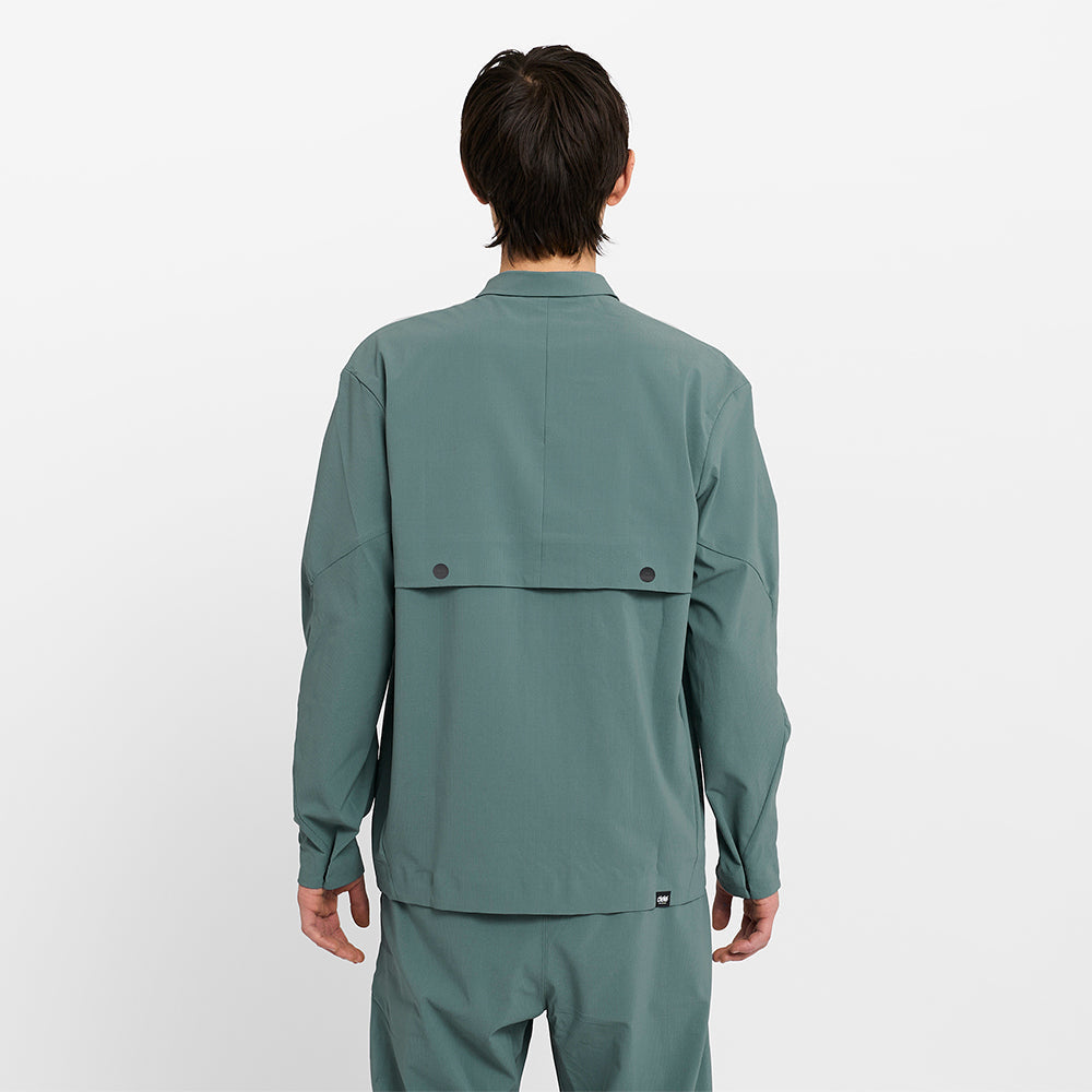 back view of ciele athletics CCJacket unisex running jacket from the Lifestyle Edition collection, in silver pine color, on a model