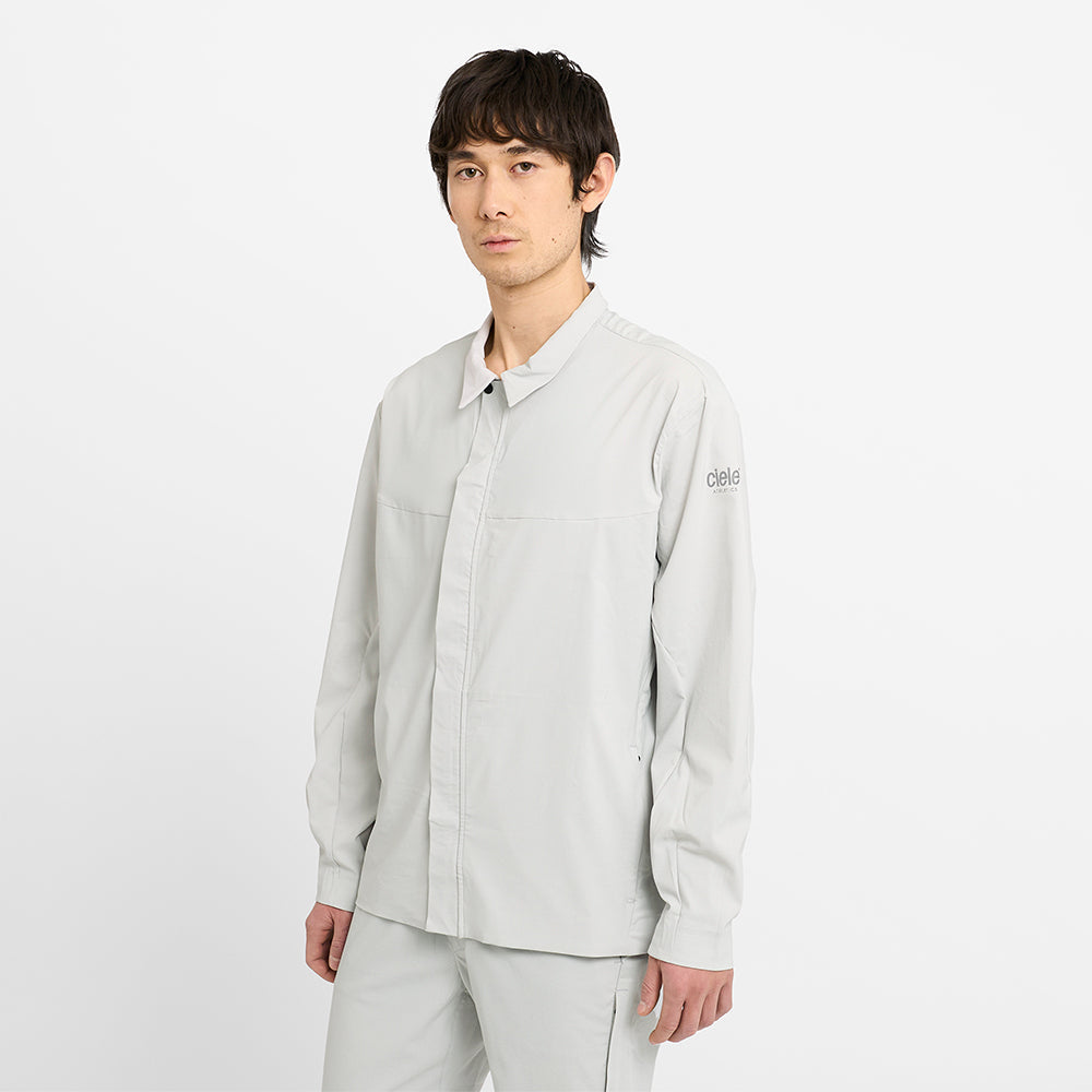 side view of ciele athletics CCJacket unisex running jacket from the Lifestyle Edition collection, in light grey color, on a model