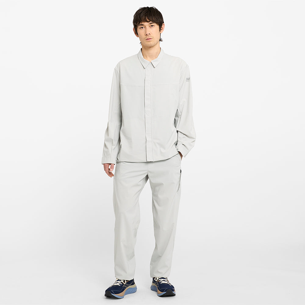 picture of the ciele athletics CCPants unisex running pants from the Lifestyle Edition collection, in light grey color, worn with the CCJacket in the light grey color, on a model