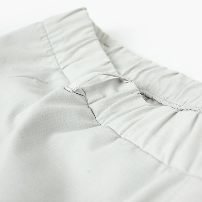 detail view of the elastic waistband of the ciele athletics CCPants unisex running pants from the Lifestyle Edition collection, in light grey color