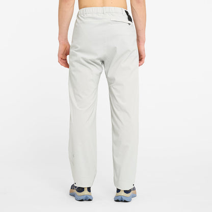 back view of ciele athletics CCPants unisex running pants from the Lifestyle Edition collection, in light grey color, on a model