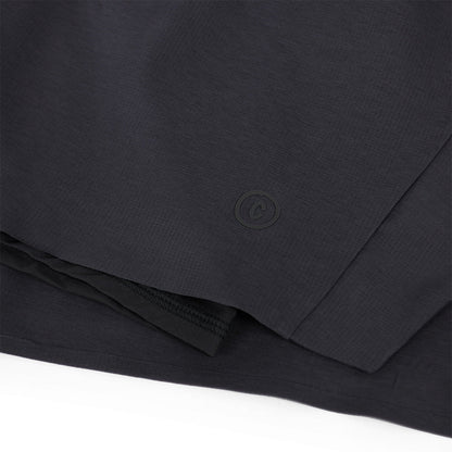 close view of the C logo and fabrics on the ciele athletics DLYShort 5 inch with a long brief in shadowcast color