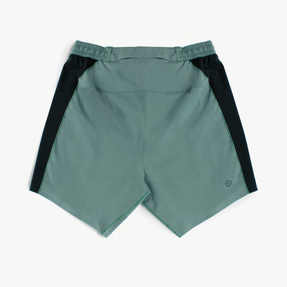 back view of ciele athletics TRNShort 7 inch linerless short in silver pine color