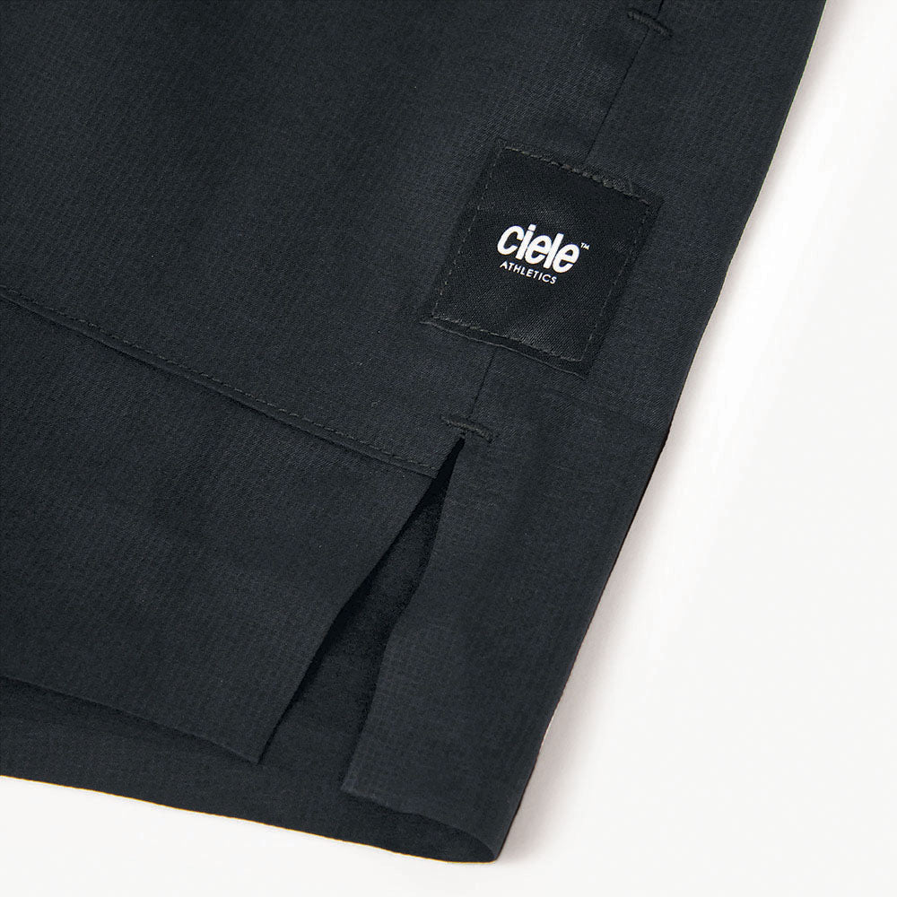 close view of the logo and fabric on the ciele athletics ATShort 5 inch with liner short in shadowcast color