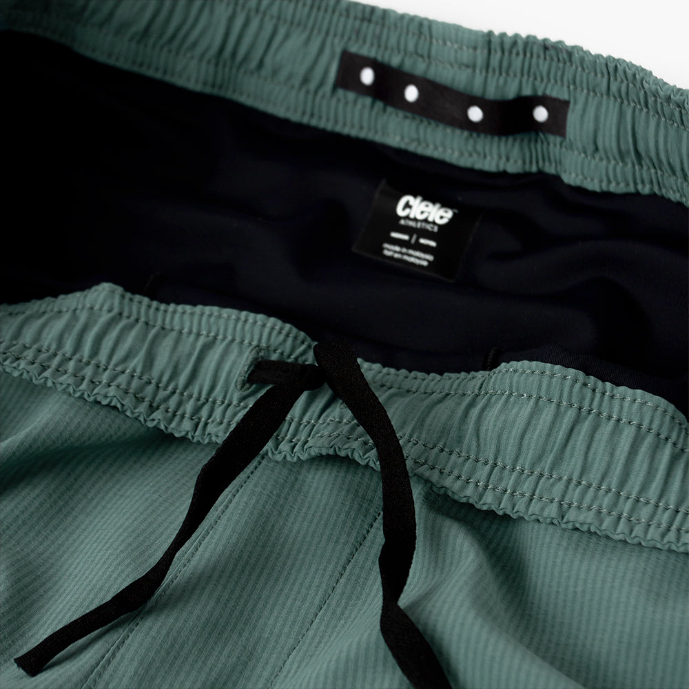 detail view of adjustable waistband of the ciele athletics WRKShort unisex running and technical short from the Lifestyle Edition collection, in silver pine color