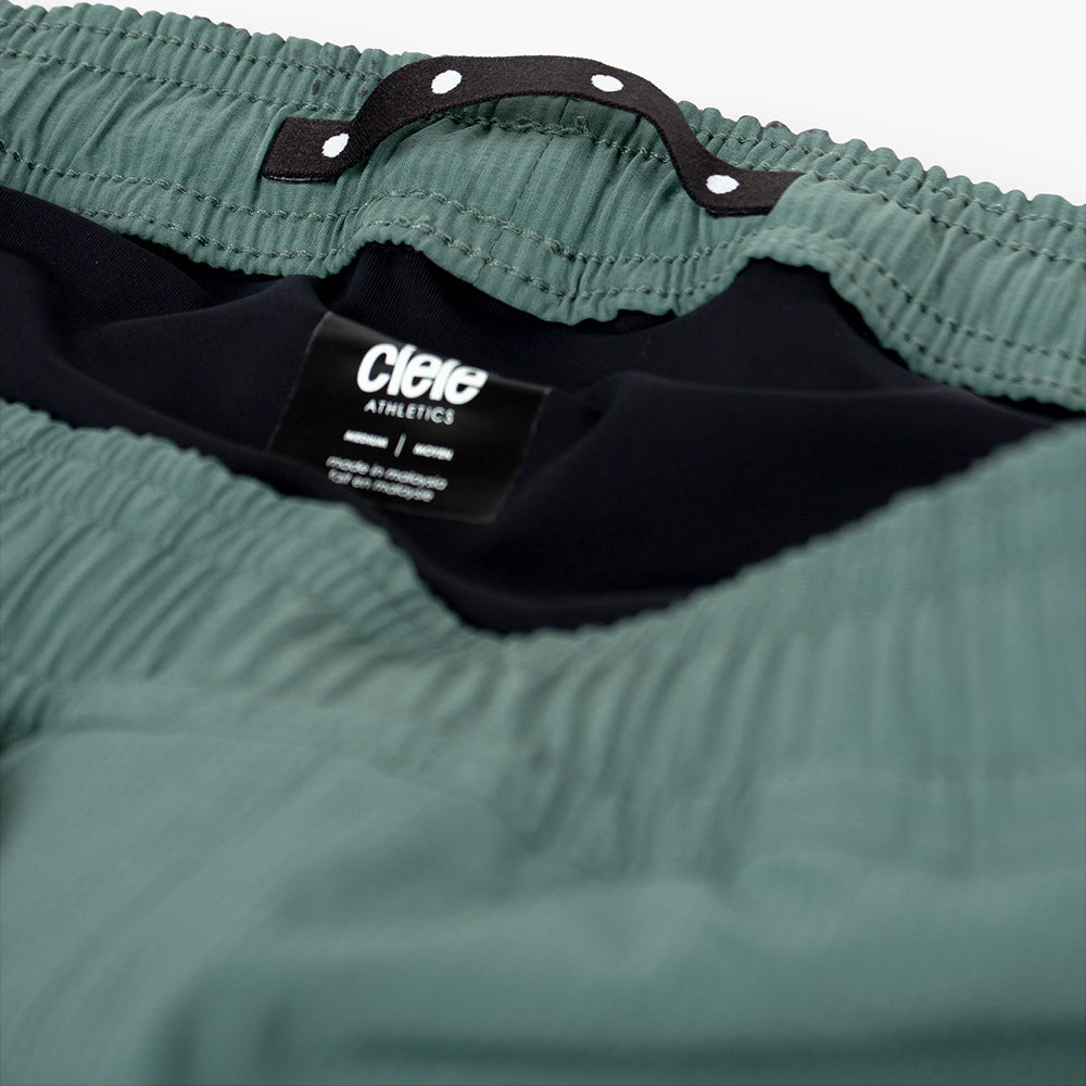 detail view of hanging loop of the ciele athletics WRKShort unisex running and technical short from the Lifestyle Edition collection, in silver pine color