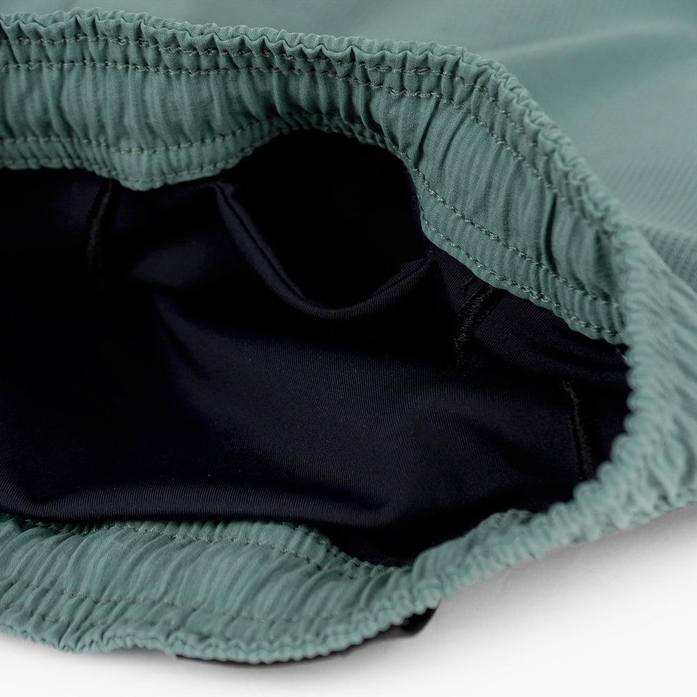 detail view of the hidden liner pocket of the ciele athletics WRKShort unisex running and technical short from the Lifestyle Edition collection, in silver pine color