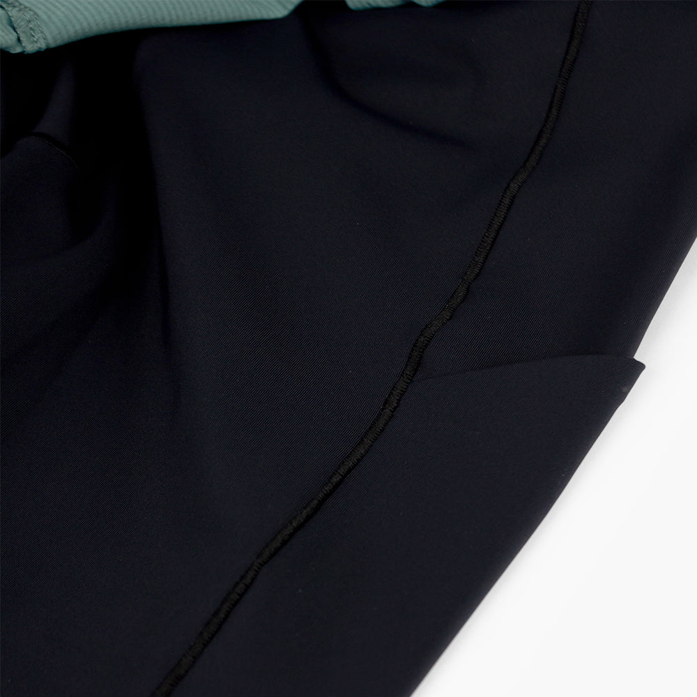 detail view of the phone pocket in the half tight of the ciele athletics WRKShort unisex running and technical short from the Lifestyle Edition collection, in silver pine color