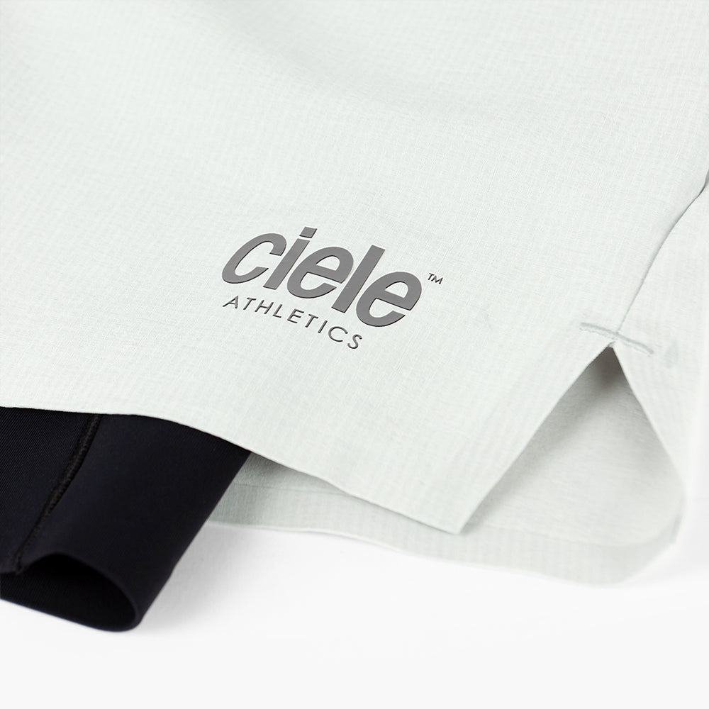 detail view of the reflective ciele logo of the ciele athletics WRKShort unisex running and technical short from the Lifestyle Edition collection, in light grey color