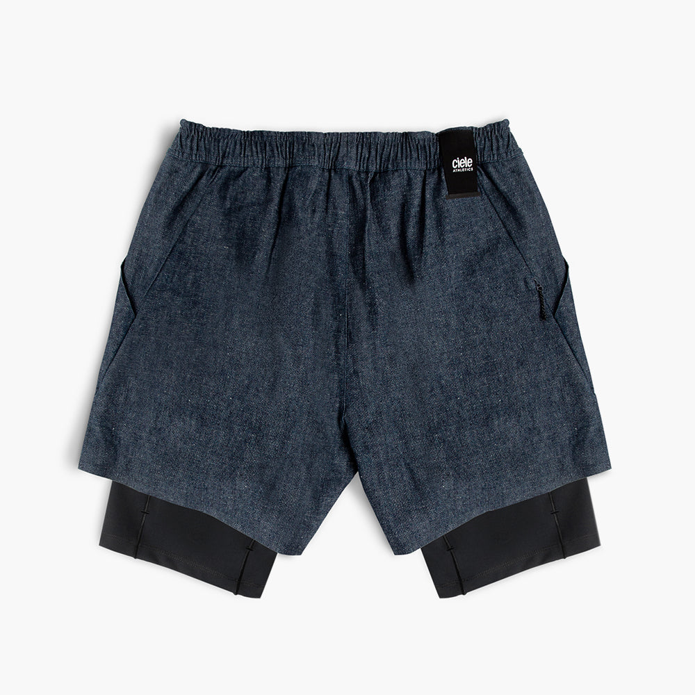 back view of ciele athletics WRKShort unisex running and technical short from the Lifestyle Edition collection, in denim indigo color, on a model
