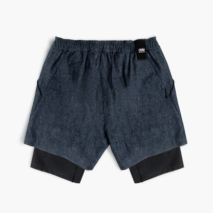 back view of ciele athletics WRKShort unisex running and technical short from the Lifestyle Edition collection, in denim indigo color, on a model