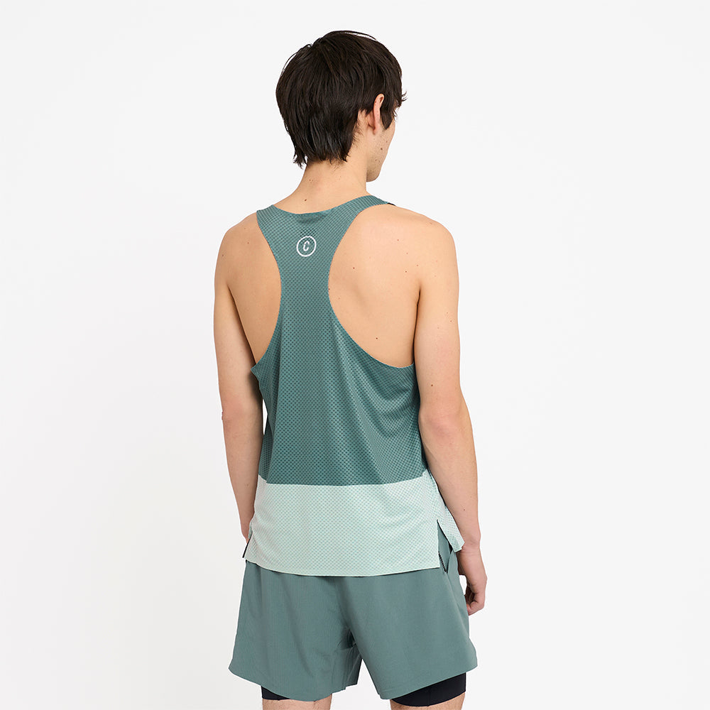 back view of the ciele athletics lightweight, race ready and performance driven singlet named RDSinglet in turquoise color from the lifetime edition, on a model