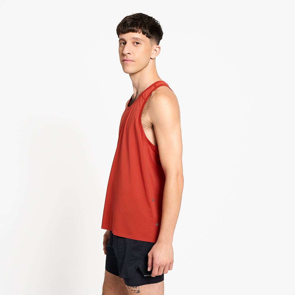 side view of ciele athletics FSTSinglet lightweight and performance driven singlet in clay on a model