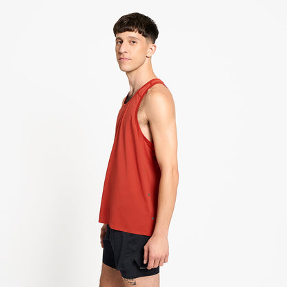 side view of ciele athletics FSTSinglet lightweight and performance driven singlet in clay on a model