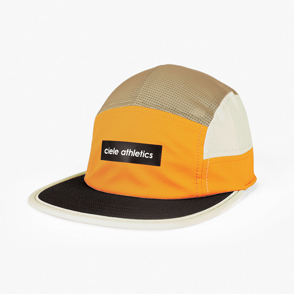 front view of ciele athletics GOCap Field Iconic Bar unisex running hat in clementine sand color