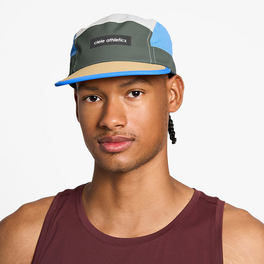 front view of the ciele athletics GOCap unisex running hat in seaweed color, on a model