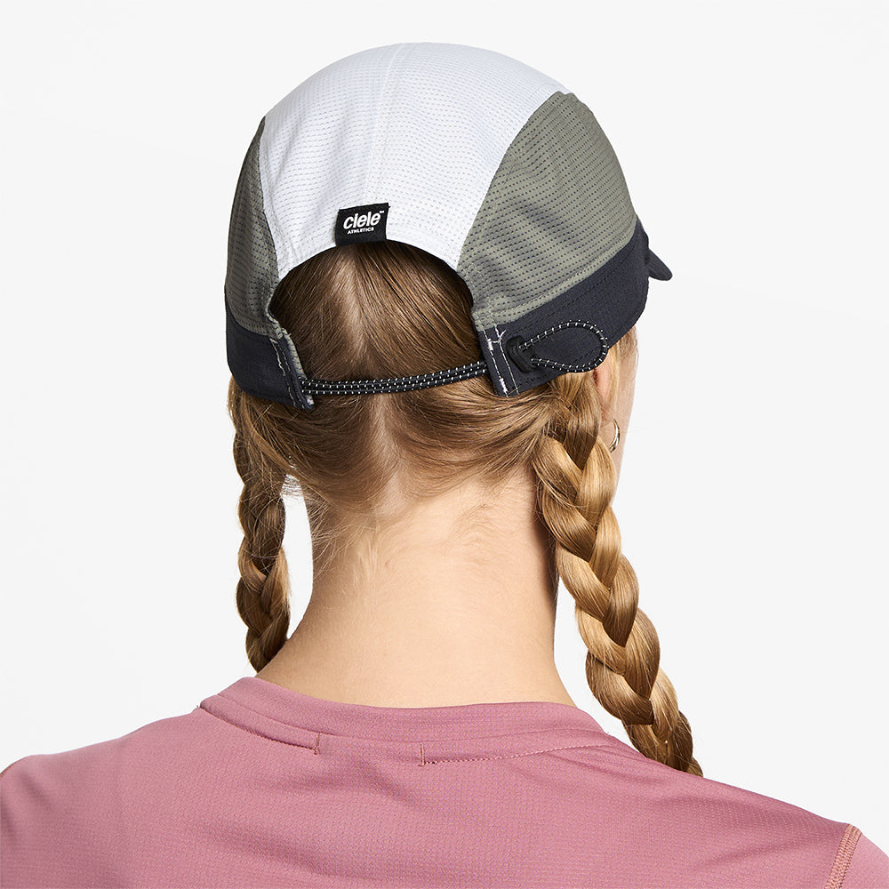 back view of ciele athletics FSTCap SC Field Iconic SL unisex running hat in whitaker color on a model
