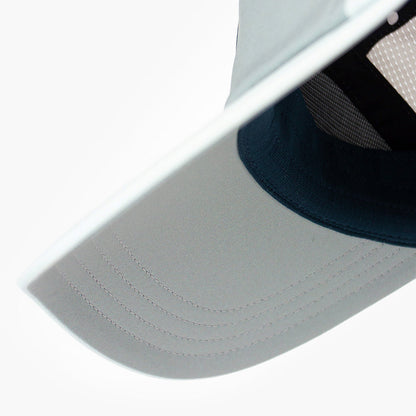 underbrim view of the ciele athletics FSTCap unisex running hat with a curved brim in neutral grey color