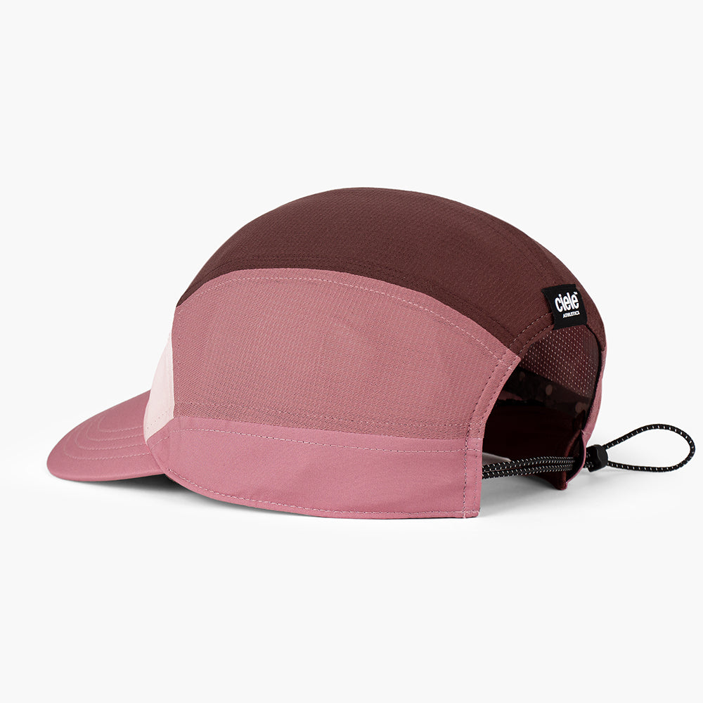 back view of the ciele athletics FTSCap unisex running hat with a curved brim in peachskin color
