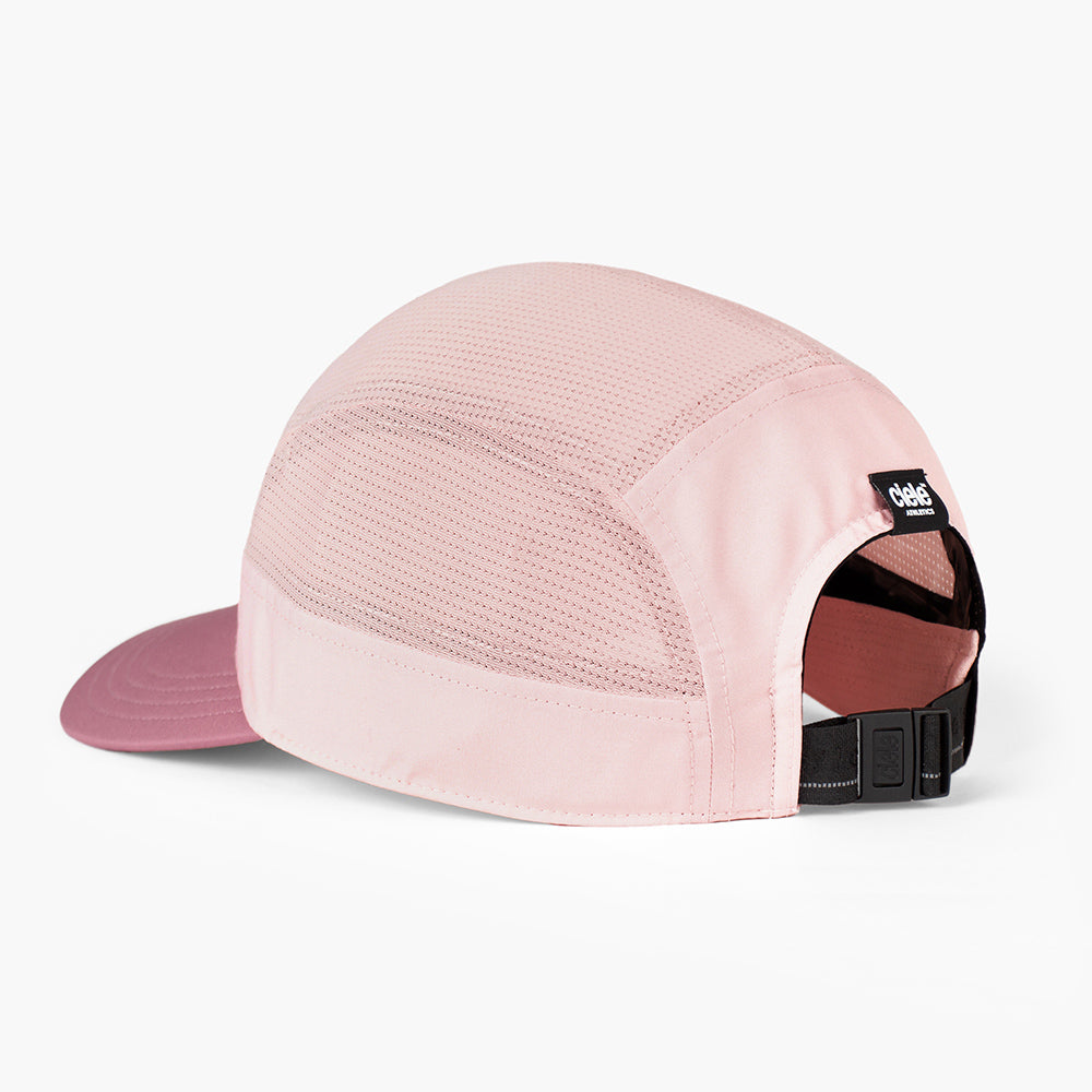 back view of the ciele athletics GOCap with a curved brim unisex running hat in peachskin color