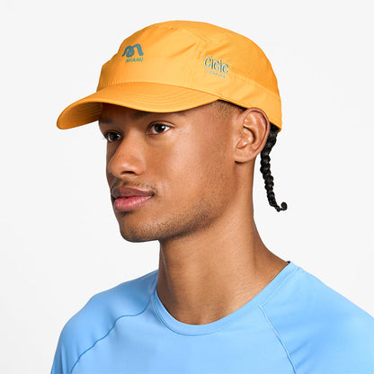 side view of ciele athletics GOCap SC Comp Word Wild Mouvement unisex running hat for the Miami marathon on a model