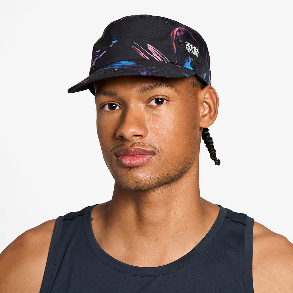 front view of the ciele athletics GOCap unisex running hat in summer nights limited edition, on a model