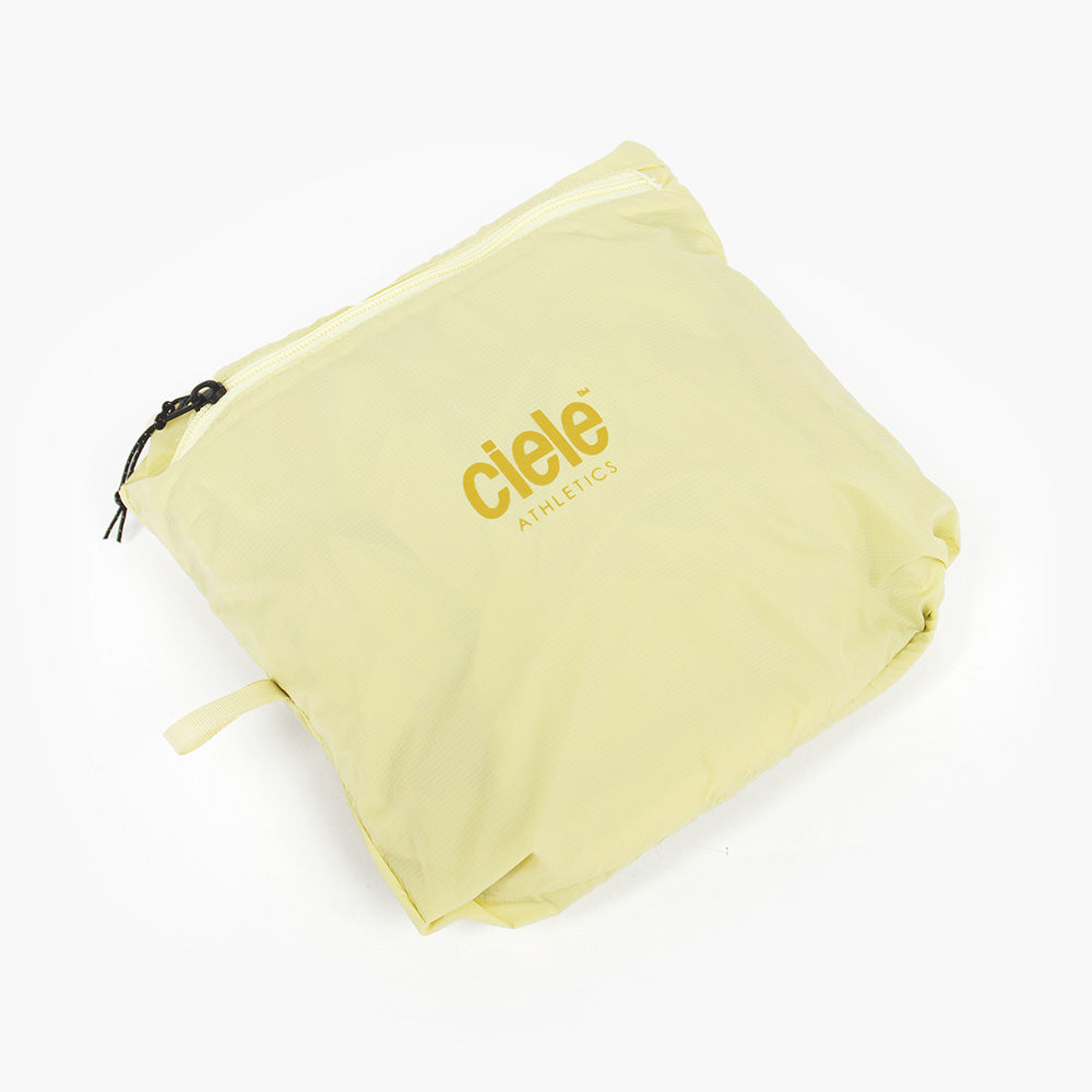 closeup view of the inside pocket logo of the ciele athletics VNTJacket lightweight running jacket for women in glade color