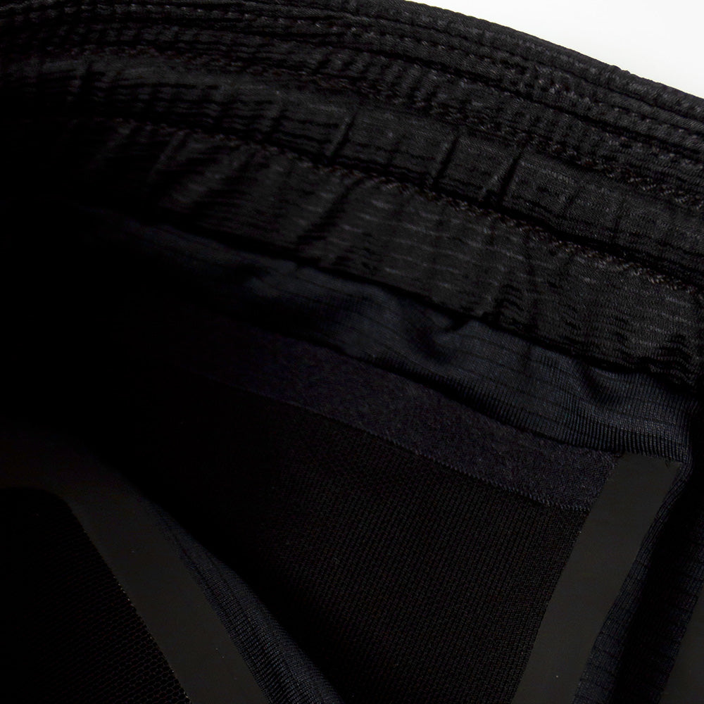 close view of the inside key pocket of the ciele athletics lightweight, race ready and performance driven short  for womens named RDShort in shadowsphinx color