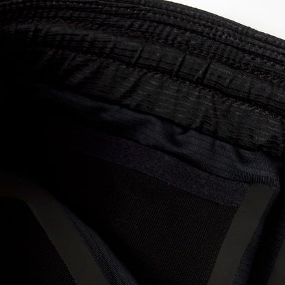 close view of the inside key pocket of the ciele athletics lightweight, race ready and performance driven short  for womens named RDShort in shadowsphinx color