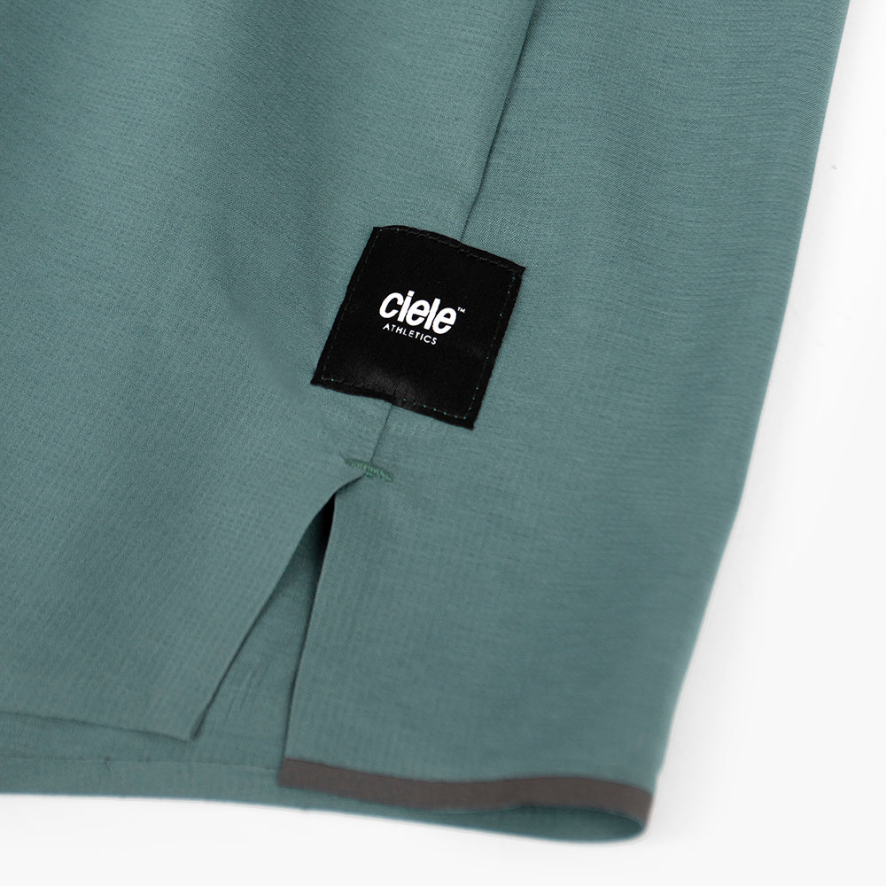 close view of the logo and fabric on the ciele athletics ATShort 4 inch with liner short in silver pine color