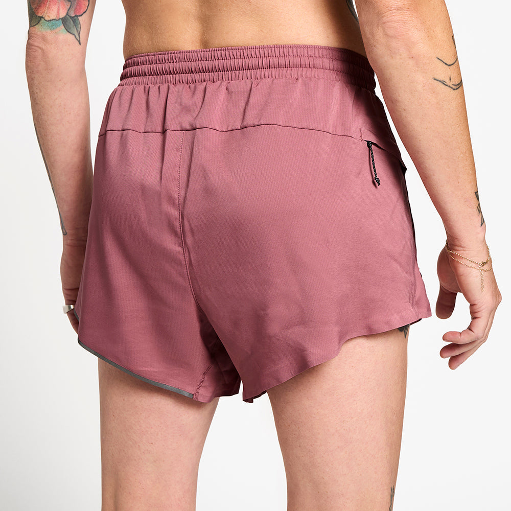 close back view of ciele athletics ATShort 4 inch with liner short in deco rose color on a model