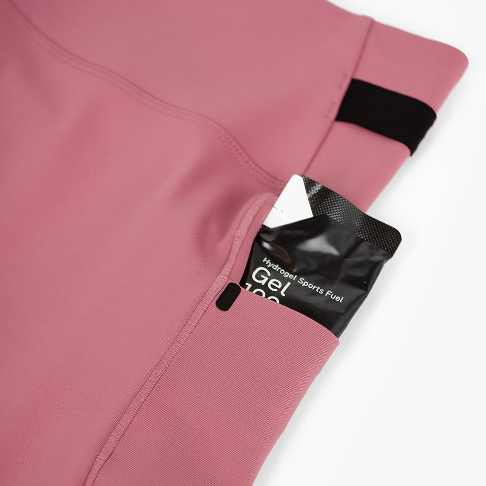 close view of side pocket on the ciele athletics FSTTight short running short in deco rose