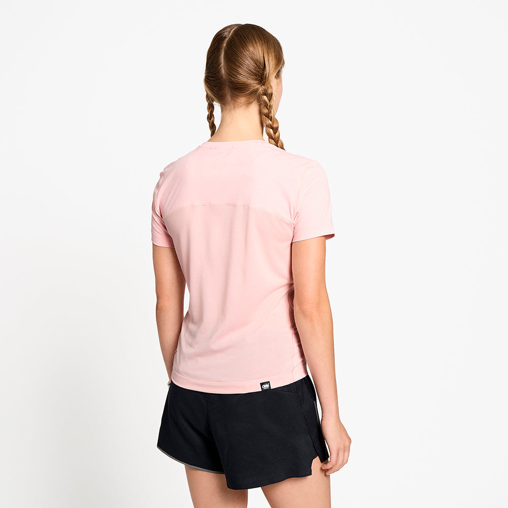 back view of ciele athletics DLYTShirt lightweight and performance driven T-Shirt in peachskin on a model