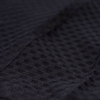 close up of the fabric of the ciele athletics lightweight, race ready and performance driven Singlet for womens named RDCRPSinglet in shadowsphinx color