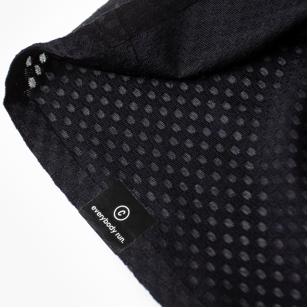close up of the ciele branding of the ciele athletics lightweight, race ready and performance driven Singlet for womens named RDCRPSinglet in shadowsphinx color