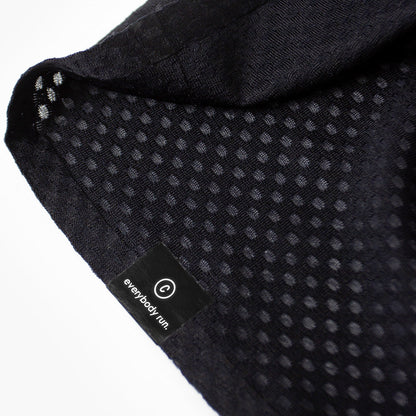 close up of the ciele branding of the ciele athletics lightweight, race ready and performance driven Singlet for womens named RDCRPSinglet in shadowsphinx color