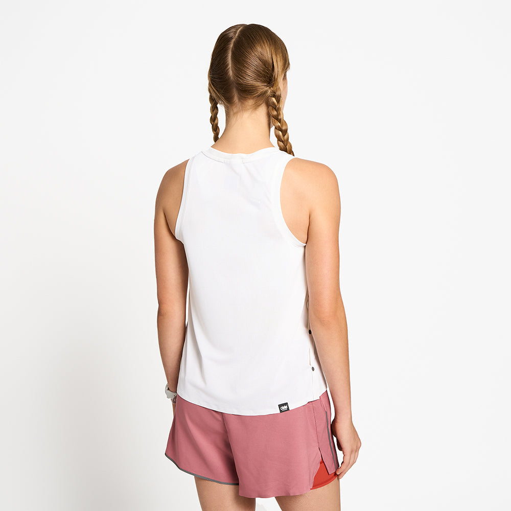 back view of ciele athletics FSTSinglet lightweight and performance driven singlet in ghost on a model