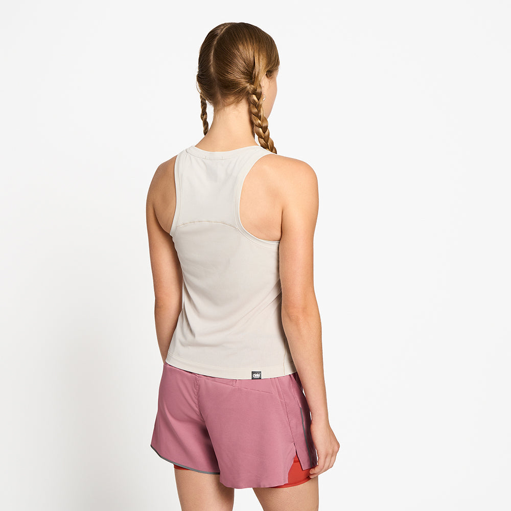 back view of ciele athletics DLYTSinglet lightweight and performance driven singlet in rainy day on a model