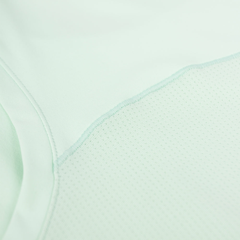 close view of the breathable fabrics on the ciele athletics DLYTSinglet lightweight and performance driven singlet in dusty turquoise